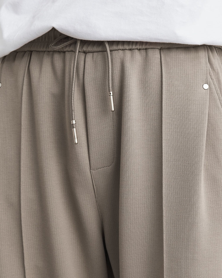 Mjuka raka byxor med midjeband och dragsko